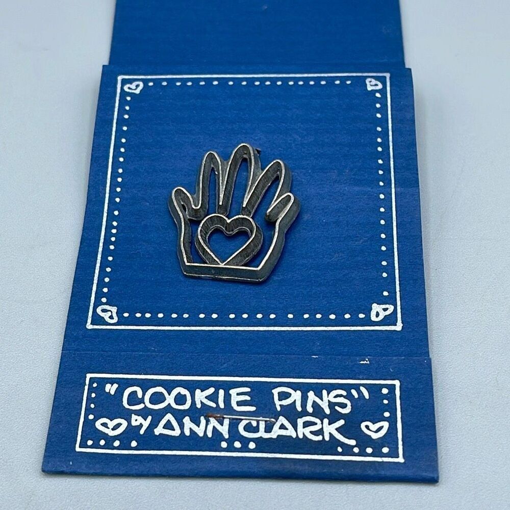 The Vermont Collection Pewter Cookie pin by Ann Clark.